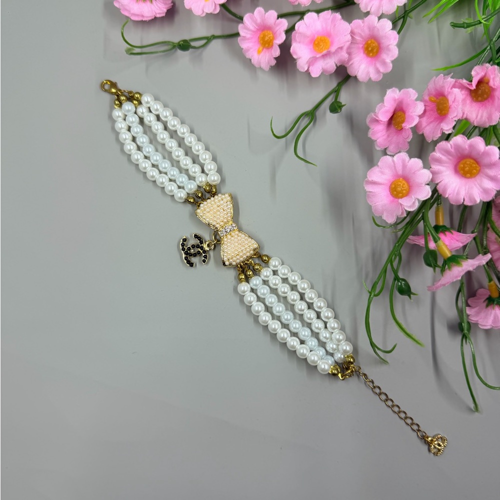 Vintage Multi Strand Pearl and Bow Bracelet with Crystal Accents